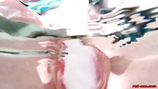 Red XXX masturbates poolside with an ice dildo